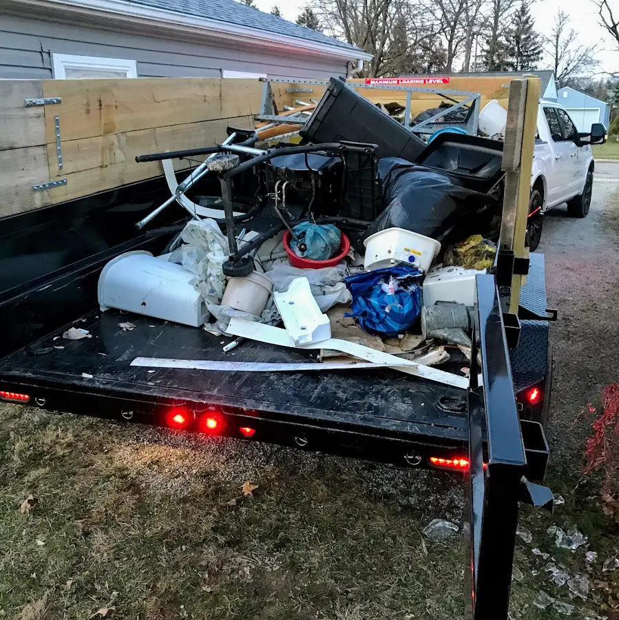 Roll-off dumpster delivered to a residential driveway in Alloway