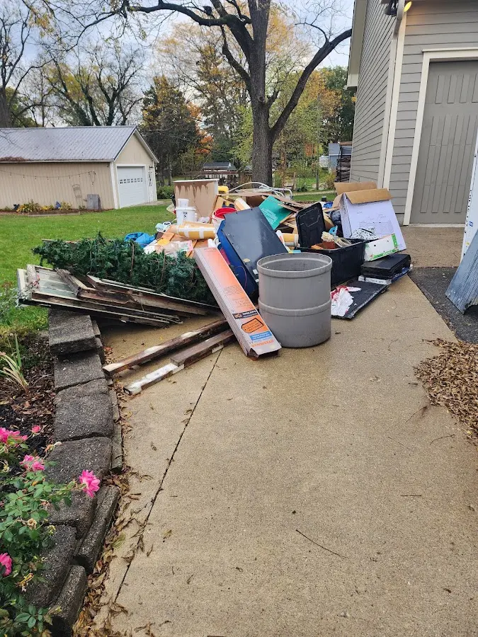 Dumpster being loaded with debris for Commercial Dumpster Rental in Alloway